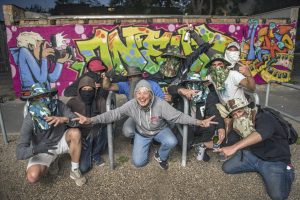 Martha Cooper with 1UP crew in front of wall they painted for her at at Urban Spree, Berlin, 2017
