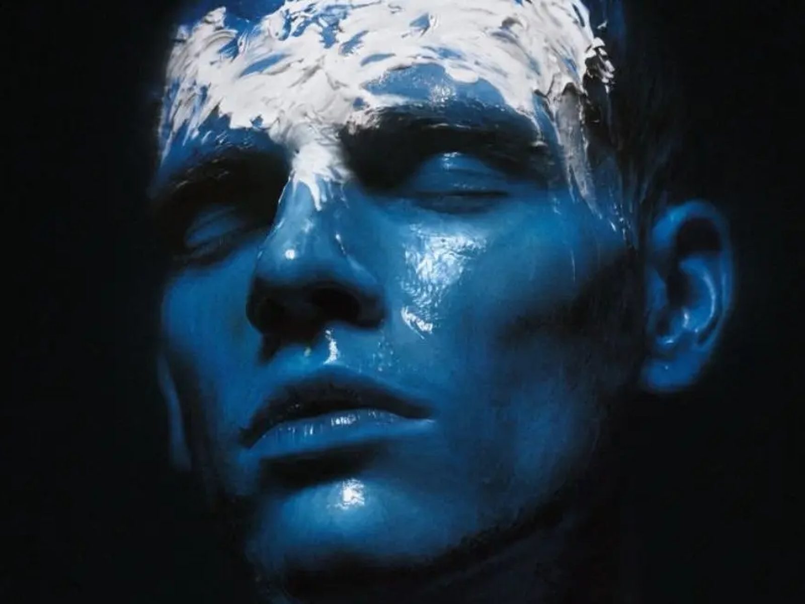 Chris Nolan La Tavola Dellumore Album Cover 2026 Artwork dell'album La Tavola dell'Umore di Chris Nolan, volto dipinto di blu su sfondo nero