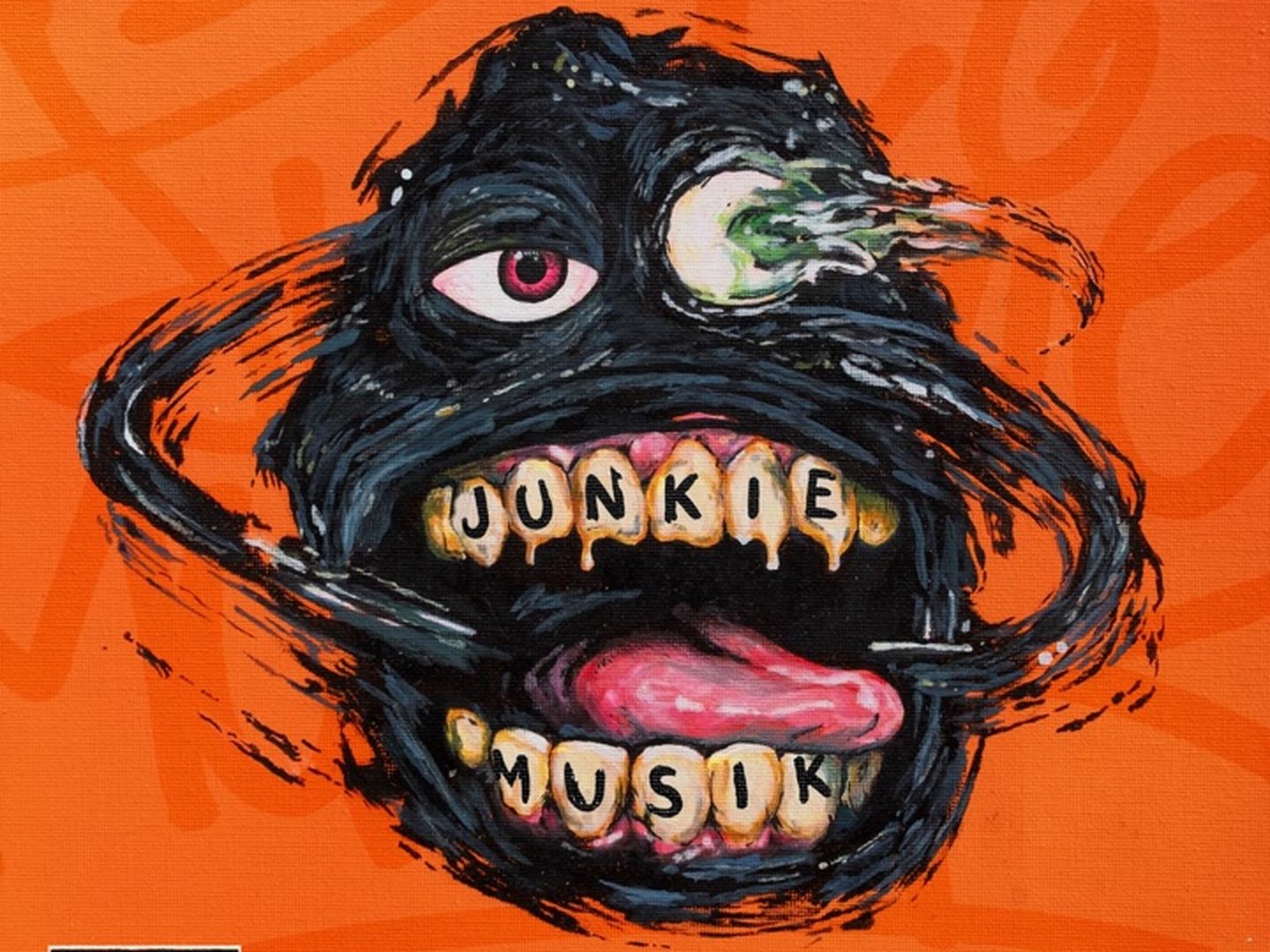 Copertina di Junkie Musik, album di TY1: illustrazione di un volto nero con denti che reggono il titolo su sfondo arancione